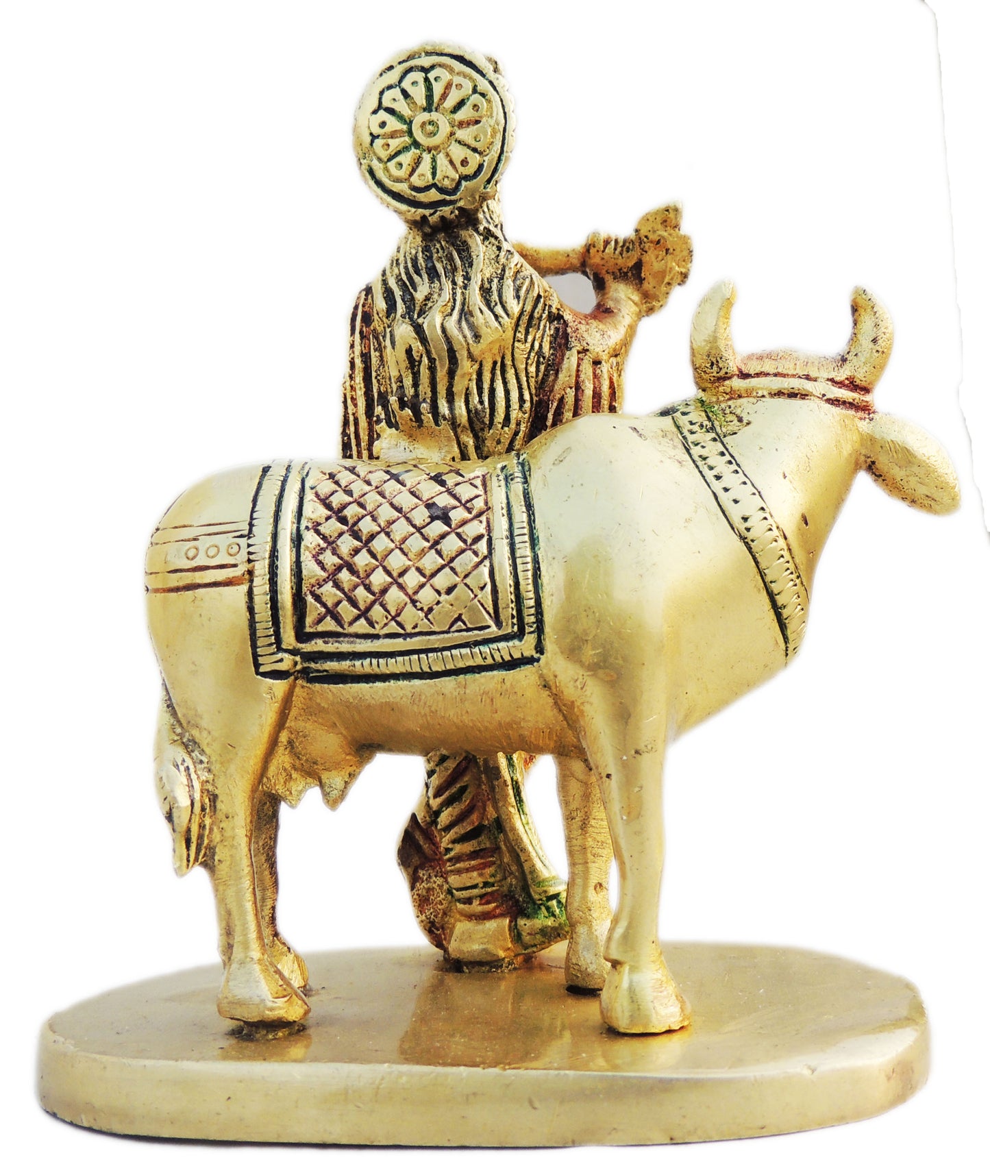 backside of the statue of lord krishna and a cow