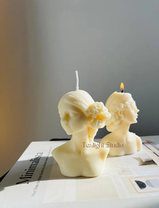 closed eye lady candle