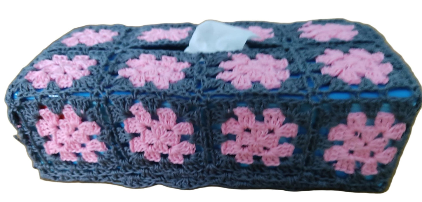 crochet tissue box made of blue and pink granny squares side view