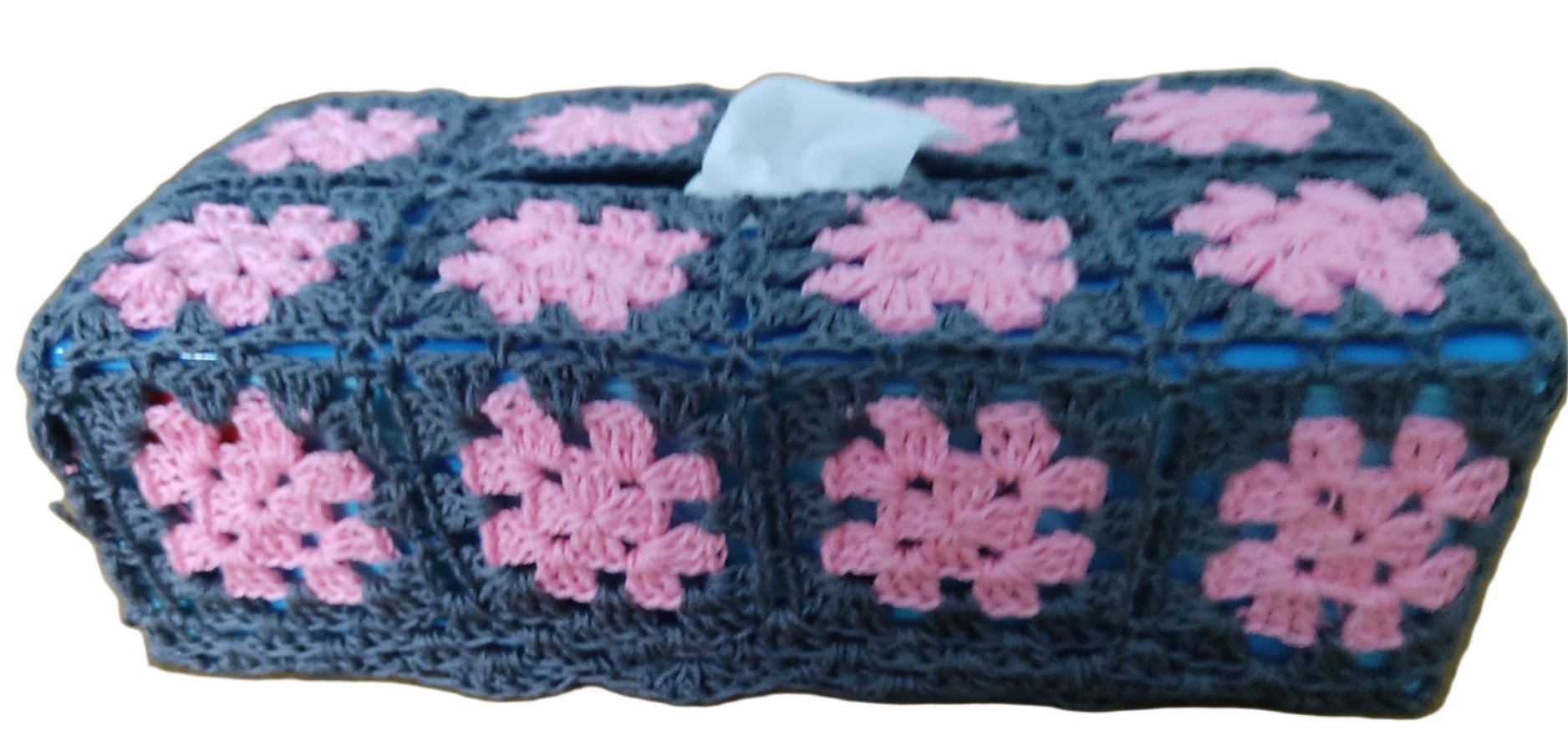 crochet tissue box made of blue and pink granny squares side view
