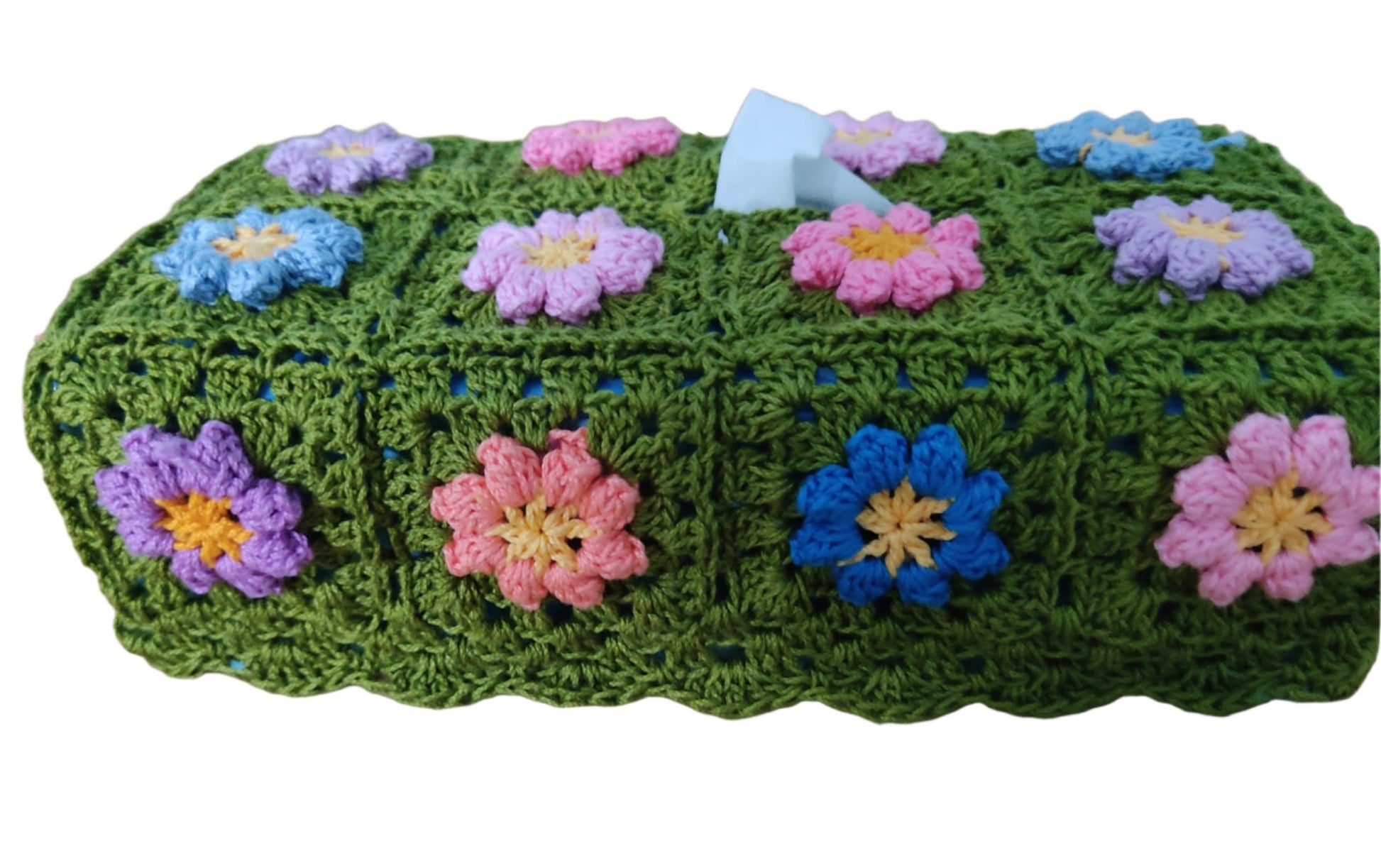 crochet tissue box made of green granny squares with flowers